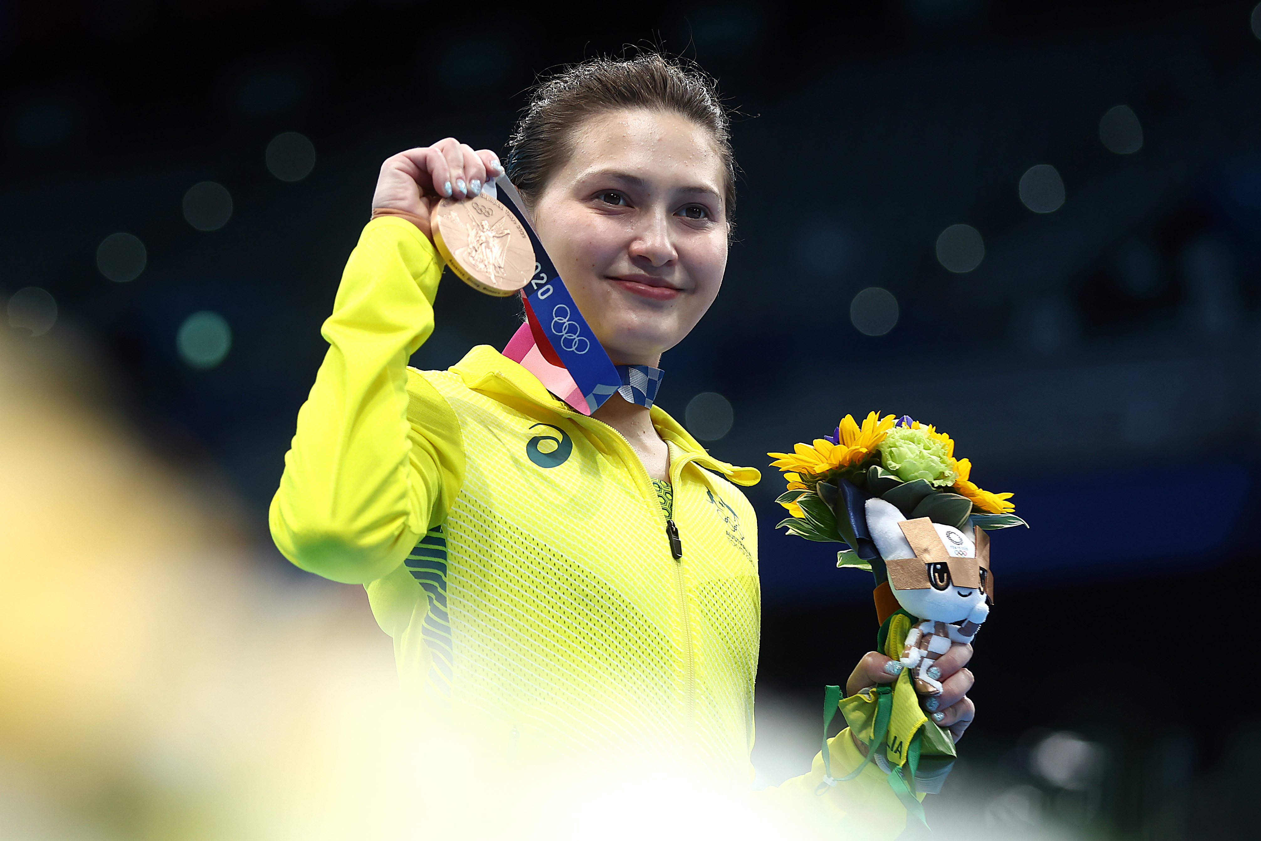 Melissa Wu dives onto the Pod... Australian Olympic Committee